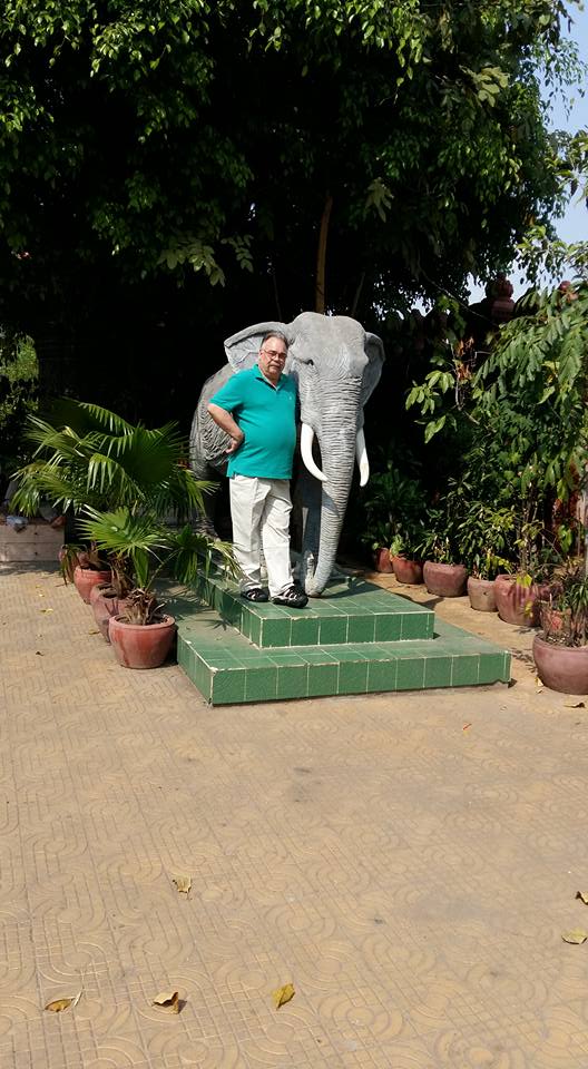 I had it in mind to pose with this elephant thinking that the contrast would make me appear smaller. You can see how that worked out for me..