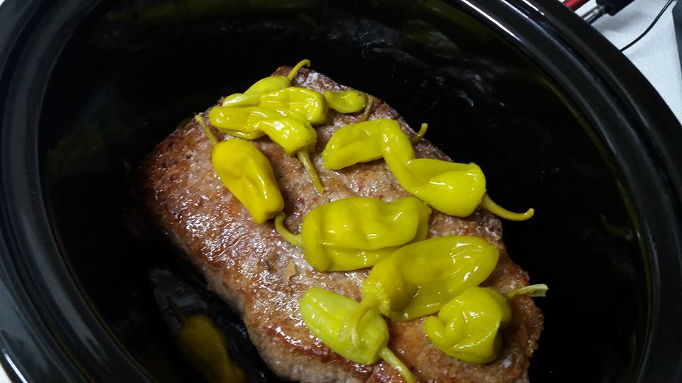 Popped it into the crock pot and added butter and pepperoncini... 